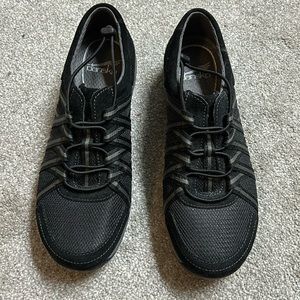 Never worn black Dansko tennis shoes.